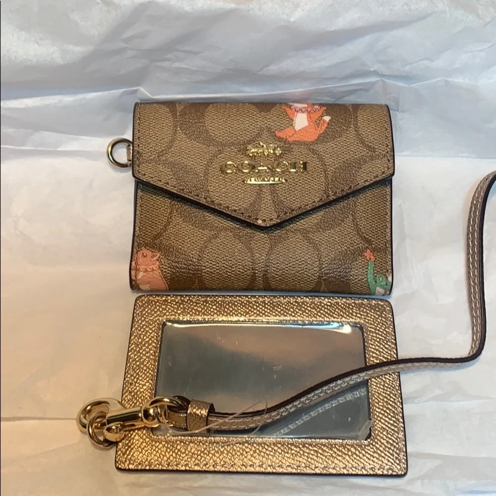 NWT Coach limited edition leashed wallet w/mirror